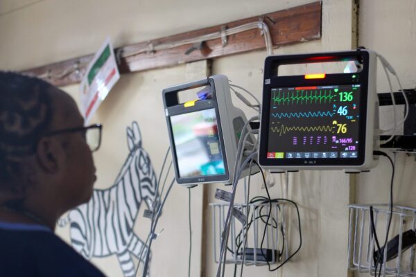 Pedaetrician monitoring a child's impala dashboard